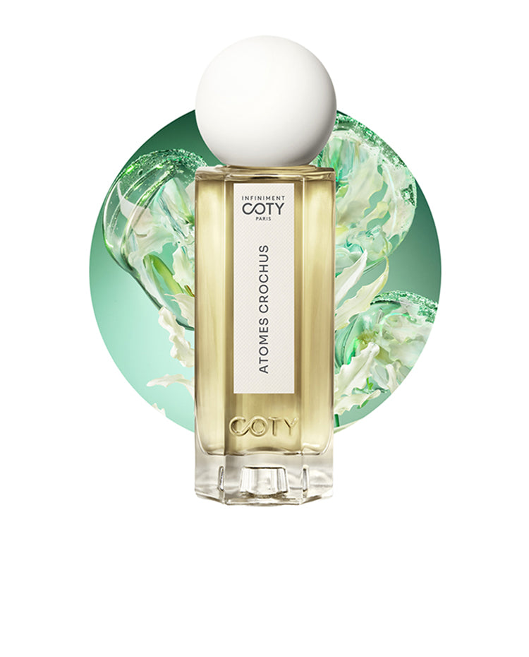 Atomes Crochus perfume bottle and ingredient