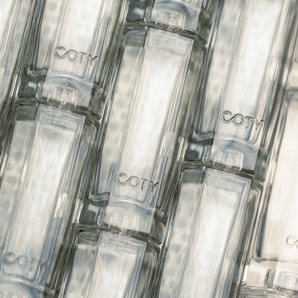 Infiniment Coty Paris stacked bottles