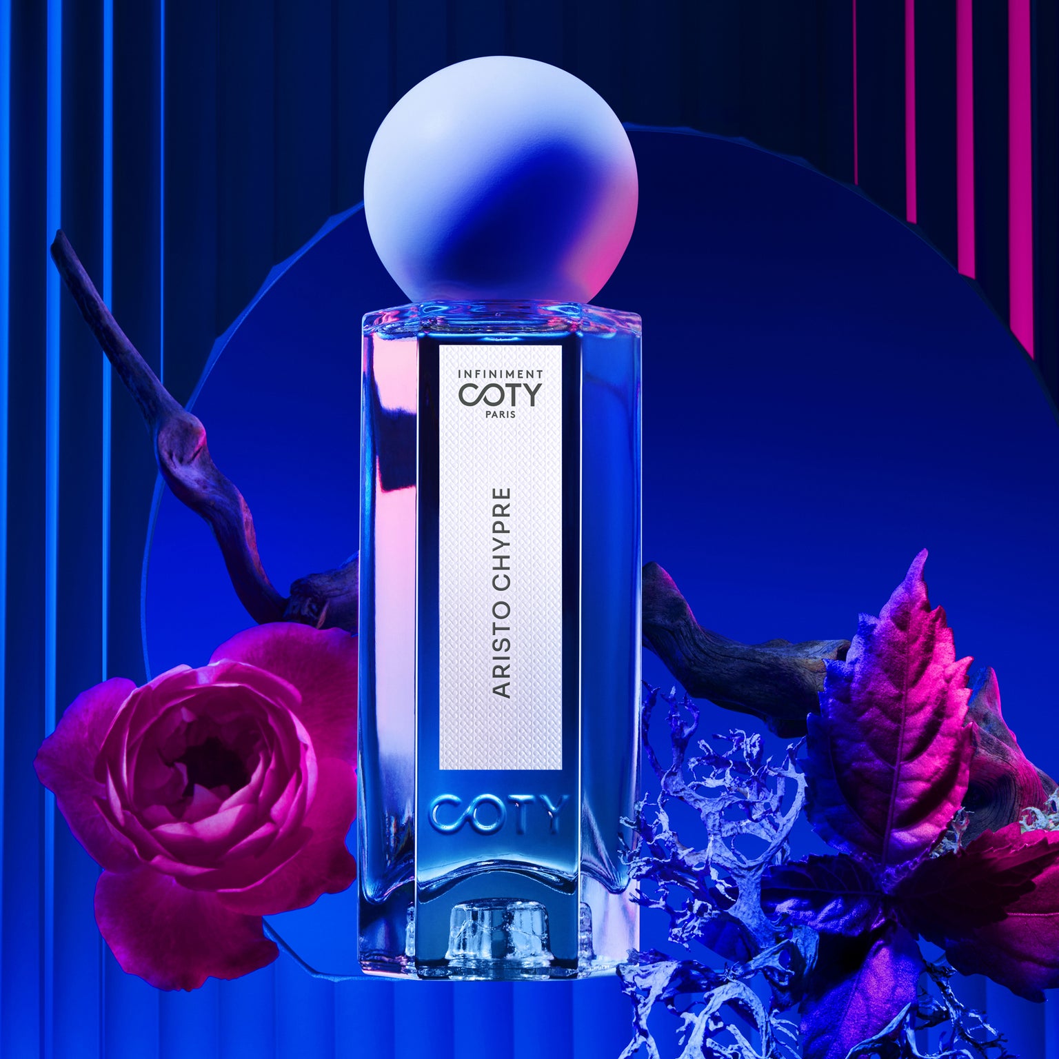 Infiniment Coty Paris perfume bottle and ingredient