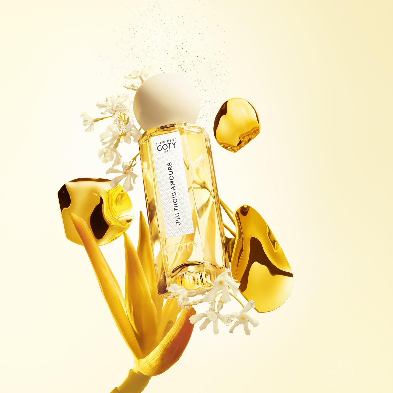 J'ai trois amours perfume bottle and ingredient